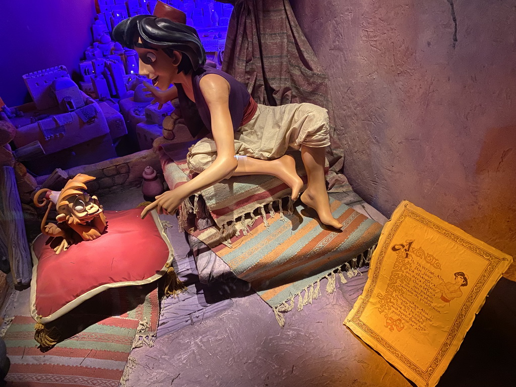 Statues of Aladdin and Abu at the Le Passage Enchanté d`Aladdin attraction at Adventureland at Disneyland Park