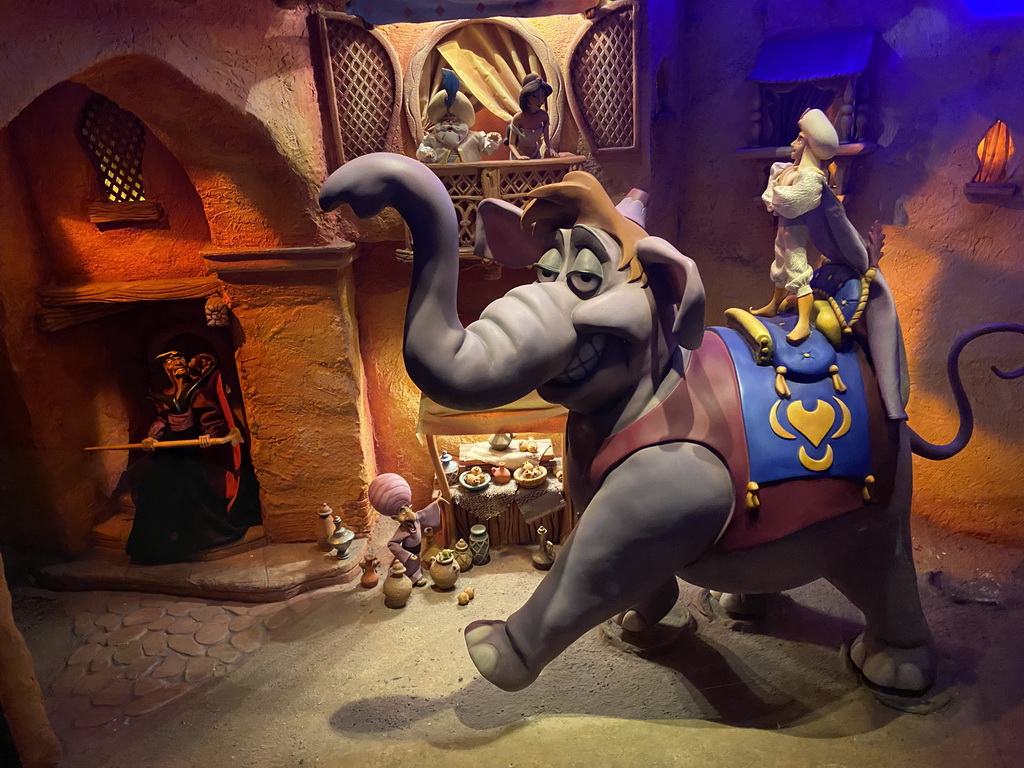 Statues of Aladdin on an Elephant, the Sultan, Jasmin, Jafar and a market salesman at the Le Passage Enchanté d`Aladdin attraction at Adventureland at Disneyland Park