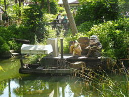 Boat with statues of Carl Fredricksen and Russell at the Adventure Isle at Adventureland at Disneyland Park