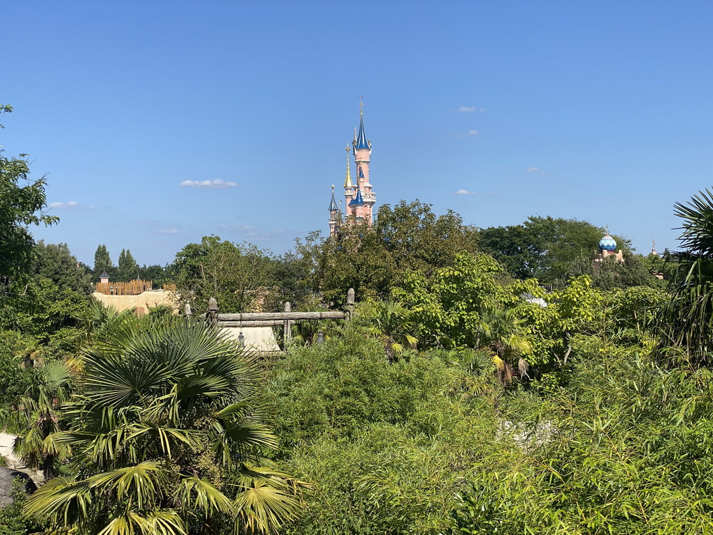 Sleeping Beauty`s Castle at Fantasyland at Disneyland Park, viewed from the south side of the suspension bridge at the Adventure Isle at Adventureland