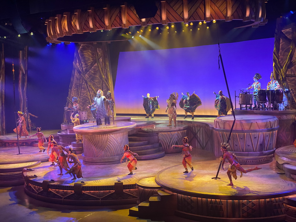 Actors and musicians on the stage of the Frontierland Theatre at Frontierland at Disneyland Park, during the Lion King: Rhythms of the Pride Lands show