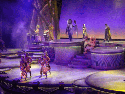 Actors and musicians on the stage of the Frontierland Theatre at Frontierland at Disneyland Park, during the Lion King: Rhythms of the Pride Lands show