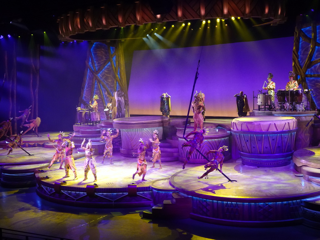 Actors and musicians on the stage of the Frontierland Theatre at Frontierland at Disneyland Park, during the Lion King: Rhythms of the Pride Lands show