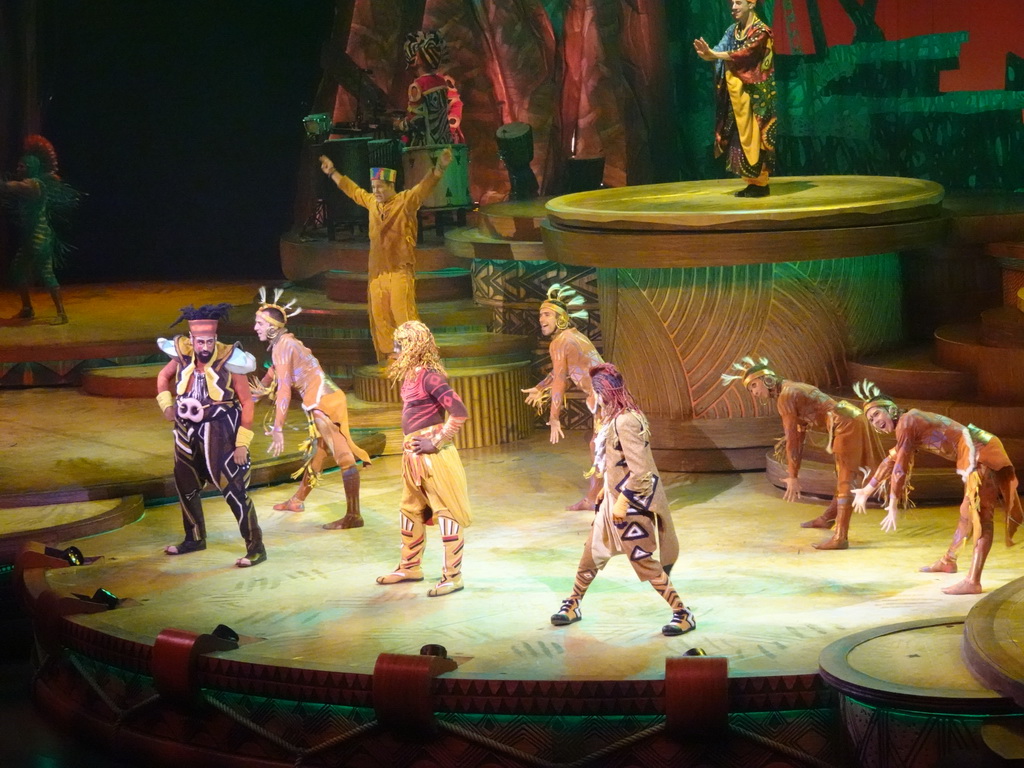 Actors and musicians on the stage of the Frontierland Theatre at Frontierland at Disneyland Park, during the Lion King: Rhythms of the Pride Lands show