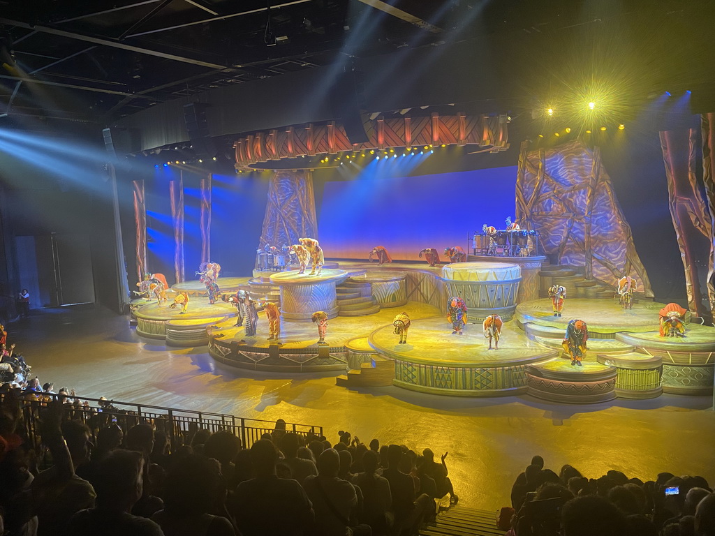 Actors and musicians on the stage of the Frontierland Theatre at Frontierland at Disneyland Park, at the end of the Lion King: Rhythms of the Pride Lands show