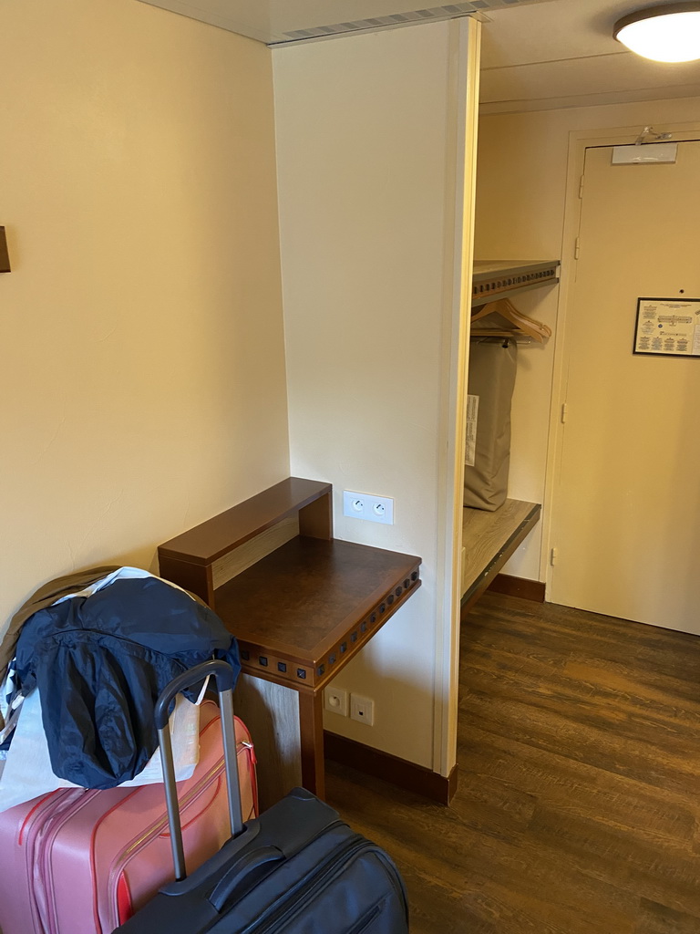 Table and wardrobe in our room at the Soaring Eagle building at Disney`s Hotel Cheyenne