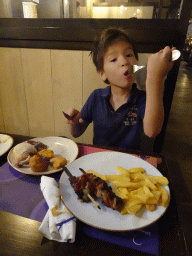 Max having dinner at the Chuck Wagon Café at Disney`s Hotel Cheyenne