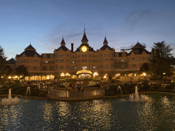 Fountains at the Fantasia Gardens and the front of the Disneyland Hotel at Disneyland Park, at sunset