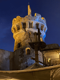 Tower at the Pirates of the Caribbean attraction at Adventureland at Disneyland Park, by night