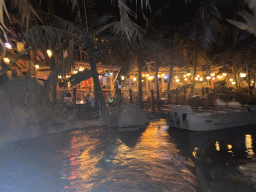 Boat at the Pirates of the Caribbean attraction at Adventureland at Disneyland Park, viewed from our boat, by night