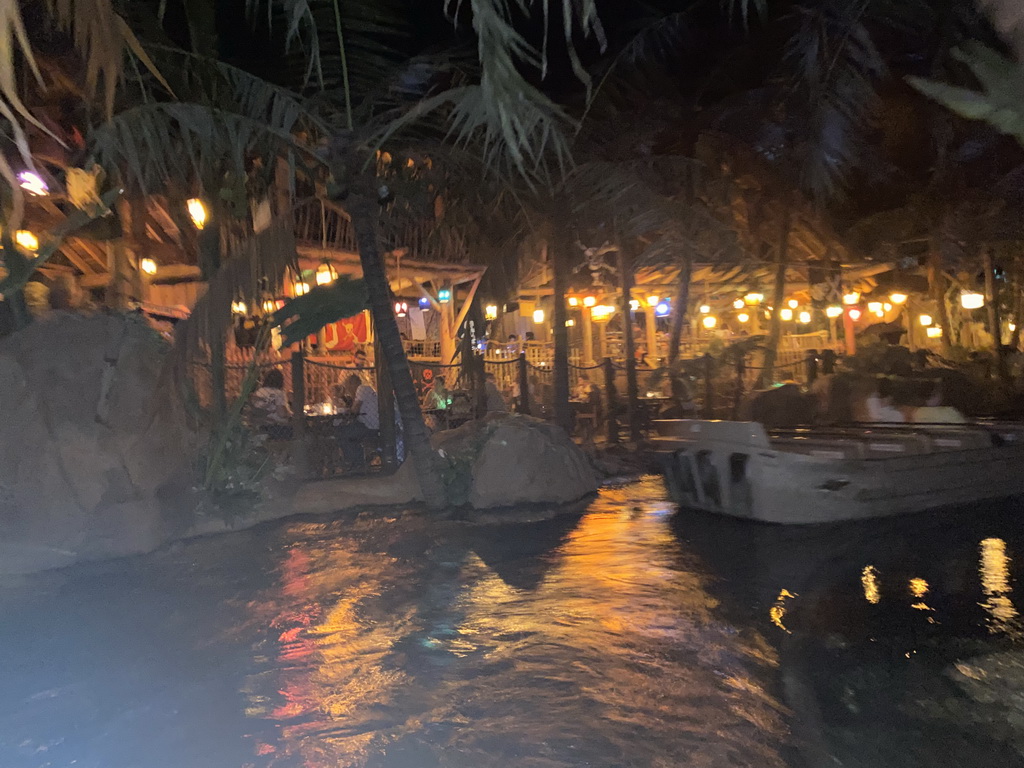 Boat at the Pirates of the Caribbean attraction at Adventureland at Disneyland Park, viewed from our boat, by night