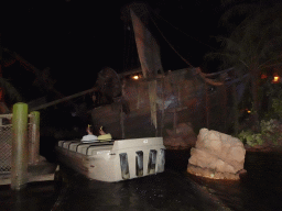 Boat and shipwreck at the Pirates of the Caribbean attraction at Adventureland at Disneyland Park, viewed from our boat, by night