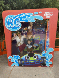 Miaomiao and Max at a remote control car at the Toy Story Playland at Walt Disney Studios Park