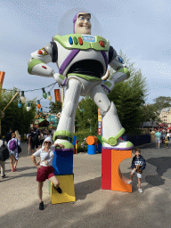 Miaomiao and Max with a statue of Buzz Lightyear at the Toy Story Playland at Walt Disney Studios Park