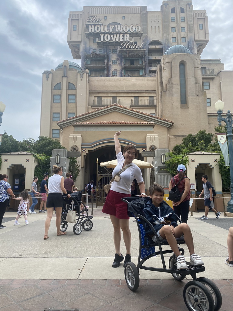 Miaomiao and Max in front of the Twilight Zone Tower of Terror attraction at the Production Courtyard at Walt Disney Studios Park