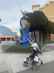 Miaomiao and Max with a statue of Mickey Mouse at the Toon Studio at Walt Disney Studios Park