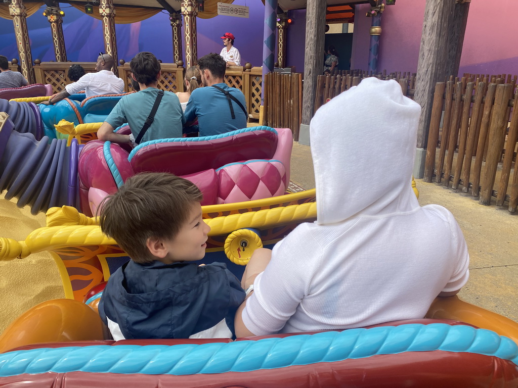 Miaomiao and Max at the Les Tapis Volants - Flying Carpets Over Agrabah attraction at the Toon Studio at Walt Disney Studios Park, viewed from Tim`s flying carpet