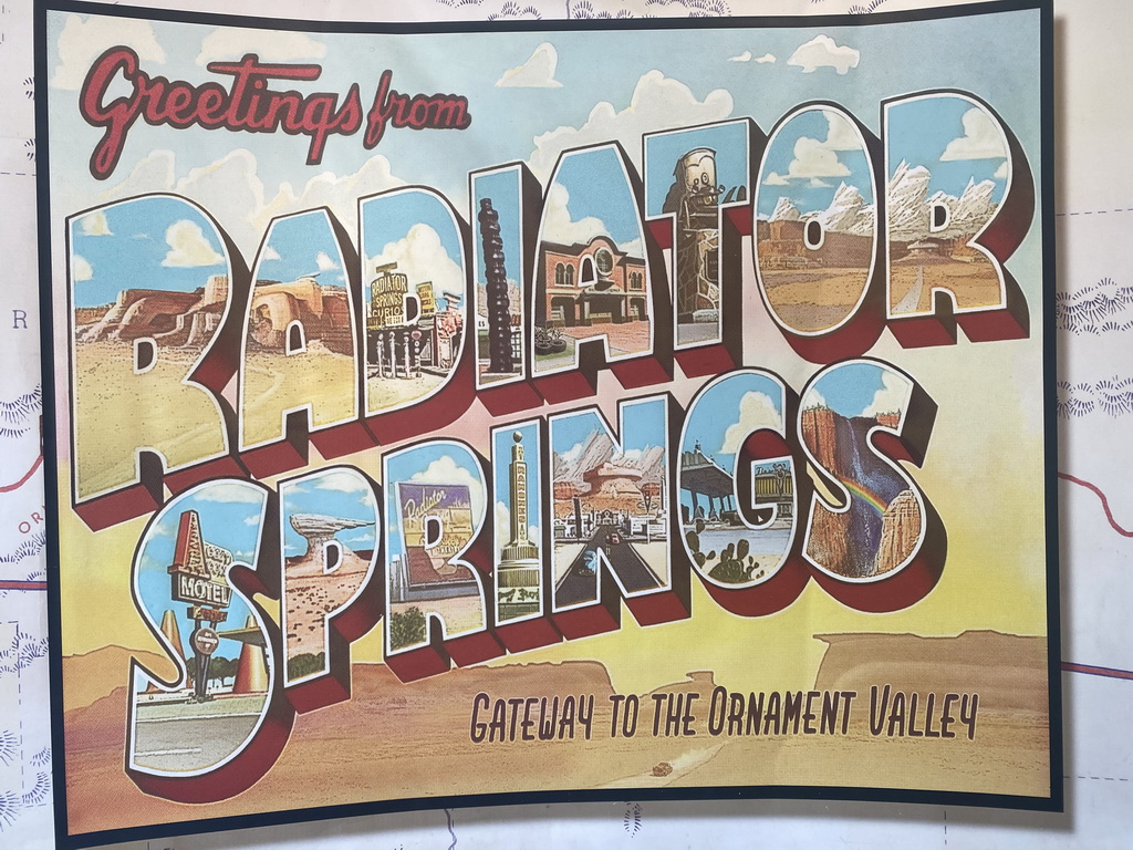Radiator Springs poster at the queue for the Cars Quatre Roues Rallye attraction at the Worlds of Pixar at Walt Disney Studios Park