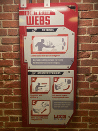 Instruction on web slinging at the queue for the Spider-Man W.E.B. Adventure attraction at the Marvel Avengers Campus at Walt Disney Studios Park