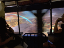 Image of a lanscape with a rainbow at Frontierland at Disneyland Park, viewed from the train at the Disneyland Railroad attraction