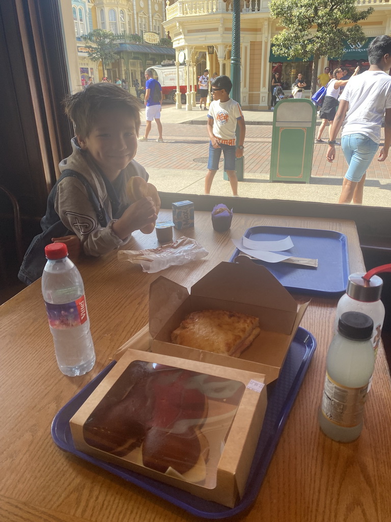 Max having lunch at the Market House Deli restaurant at the Discovery Arcade at Main Street U.S.A. at Disneyland Park