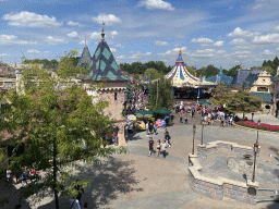 The Blanche-Neige et les Sept Nains, the Le Carrousel de Lancelot and Mad Hatter`s Tea Cups attractions and the Auberge de Cendrillon restaurant at Fantasyland at Disneyland Park, viewed from the balcony at the back side of Sleeping Beauty`s Castle