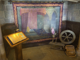 Book, tapestry and spinning wheel at the upper floor of Sleeping Beauty`s Castle at Fantasyland at Disneyland Park