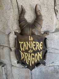 Sign in front of the La Tanière du Dragon attraction at Fantasyland at Disneyland Park