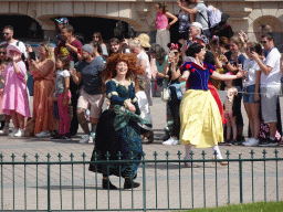 Merida and Snow White at the World Princess Week Parade at Central Plaza at Disneyland Park