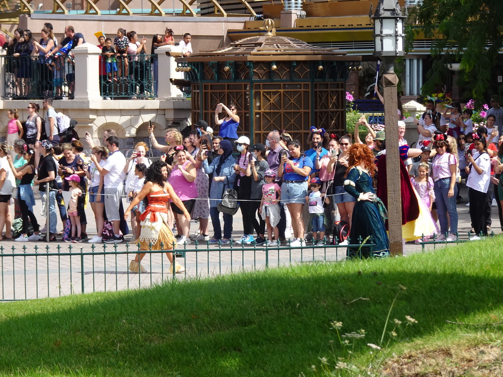 Vaiana, Merida and Snow White at the World Princess Week Parade at Central Plaza at Disneyland Park