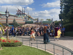 Vaiana, Merida and Snow White at the World Princess Week Parade at Central Plaza at Disneyland Park