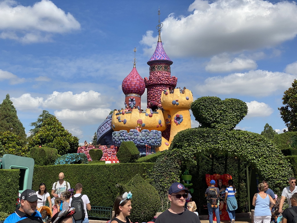 Front of the Alice`s Curious Labyrinth attraction with the Queen of Hearts` Castle at Fantasyland at Disneyland Park