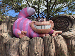 Statue of the Cheshire Cay at the Alice`s Curious Labyrinth attraction at Fantasyland at Disneyland Park