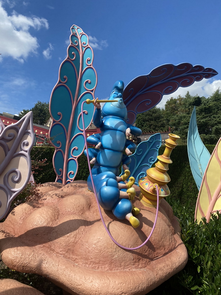 Statue of the Caterpillar at the Alice`s Curious Labyrinth attraction at Fantasyland at Disneyland Park