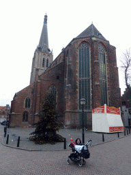 Miaomiao and Max in his buggy in front of a christmas tree at the southeast side of the Martinikerk church at the Markt square