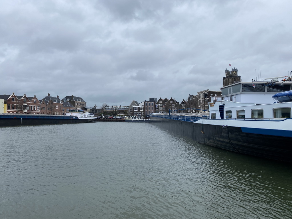 Boats at the Kalkhaven harbour and the tower of the Church of Our Lady, viewed from the Achterhakkers street