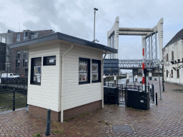 Small house at the Kalkhaven harbour and the Dordrecht Railway Bridge and the Stadsbrug Zwijndrecht bridge over the Oude Maas river