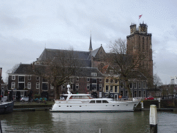 Boat at the Nieuwe Haven harbour and the north side of the Church of Our Lady, viewed from the Nieuwe Haven street