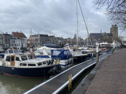 Boats at the Nieuwe Haven harbour and the northeast side of the Church of Our Lady, viewed from the Nieuwe Haven street