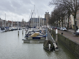 Boats at the Nieuwe Haven harbour and the northeast side of the Church of Our Lady, viewed from the Roobrug bridge