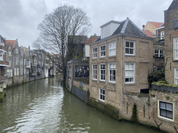 The Voorstraatshaven harbour and the painting `Grachtwacht` by Frans Kromeich and Rob van Kooten, viewed from the Lombardbrug bridge