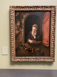 Painting `Girl at a Window` by Nicolaes Maes at the Upper Floor of the Dordrechts Museum, with explanation
