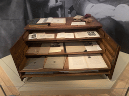 Cabinet with books at the exhibition `The Eye of Jan Veth` at the Upper Floor of the Dordrechts Museum