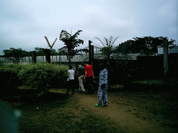 Tim, his friend and the chicken farmer at the chicken farm