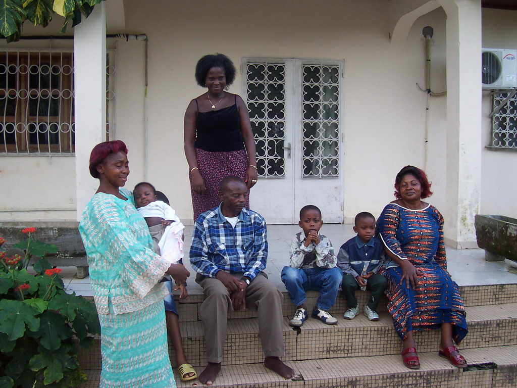 Our friends in front of the chicken farmer`s house