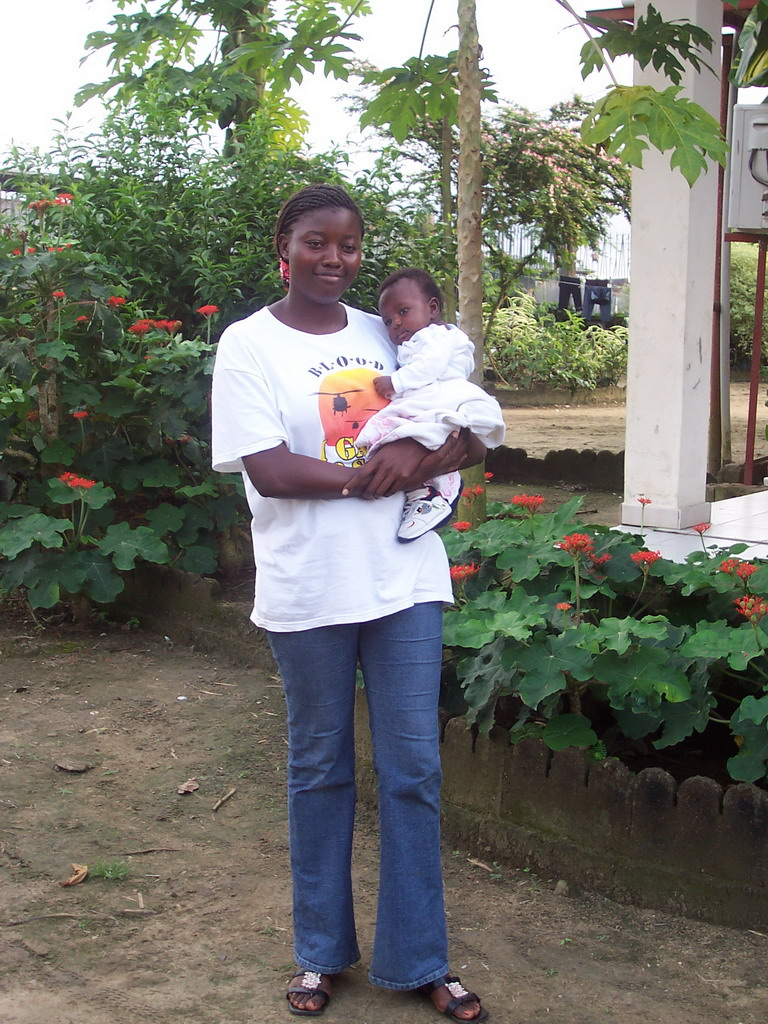 Our friends in front of the chicken farmer`s house