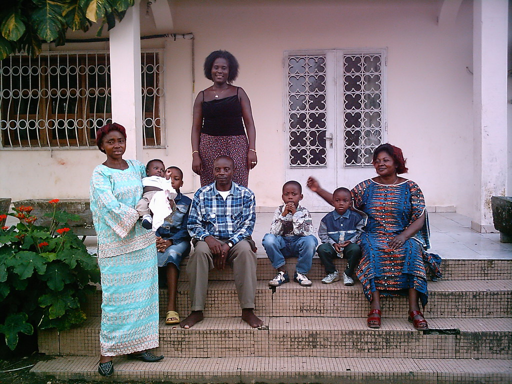 Our friends in front of the chicken farmer`s house