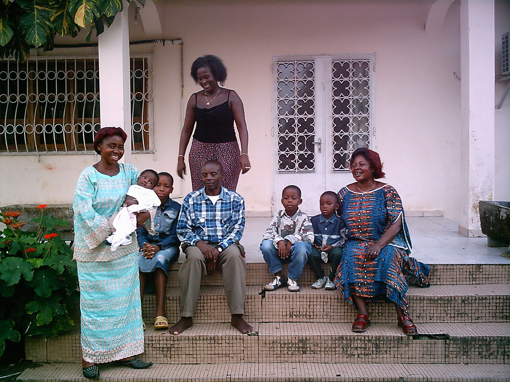 Our friends in front of the chicken farmer`s house