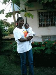 Our friends in front of the chicken farmer`s house