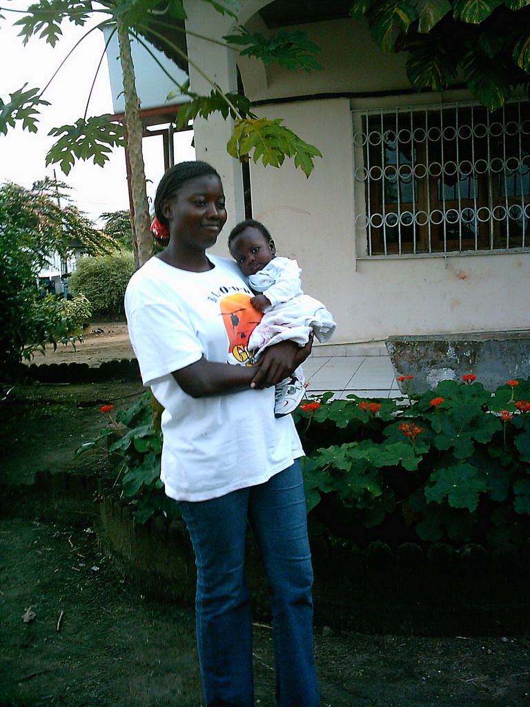 Our friends in front of the chicken farmer`s house